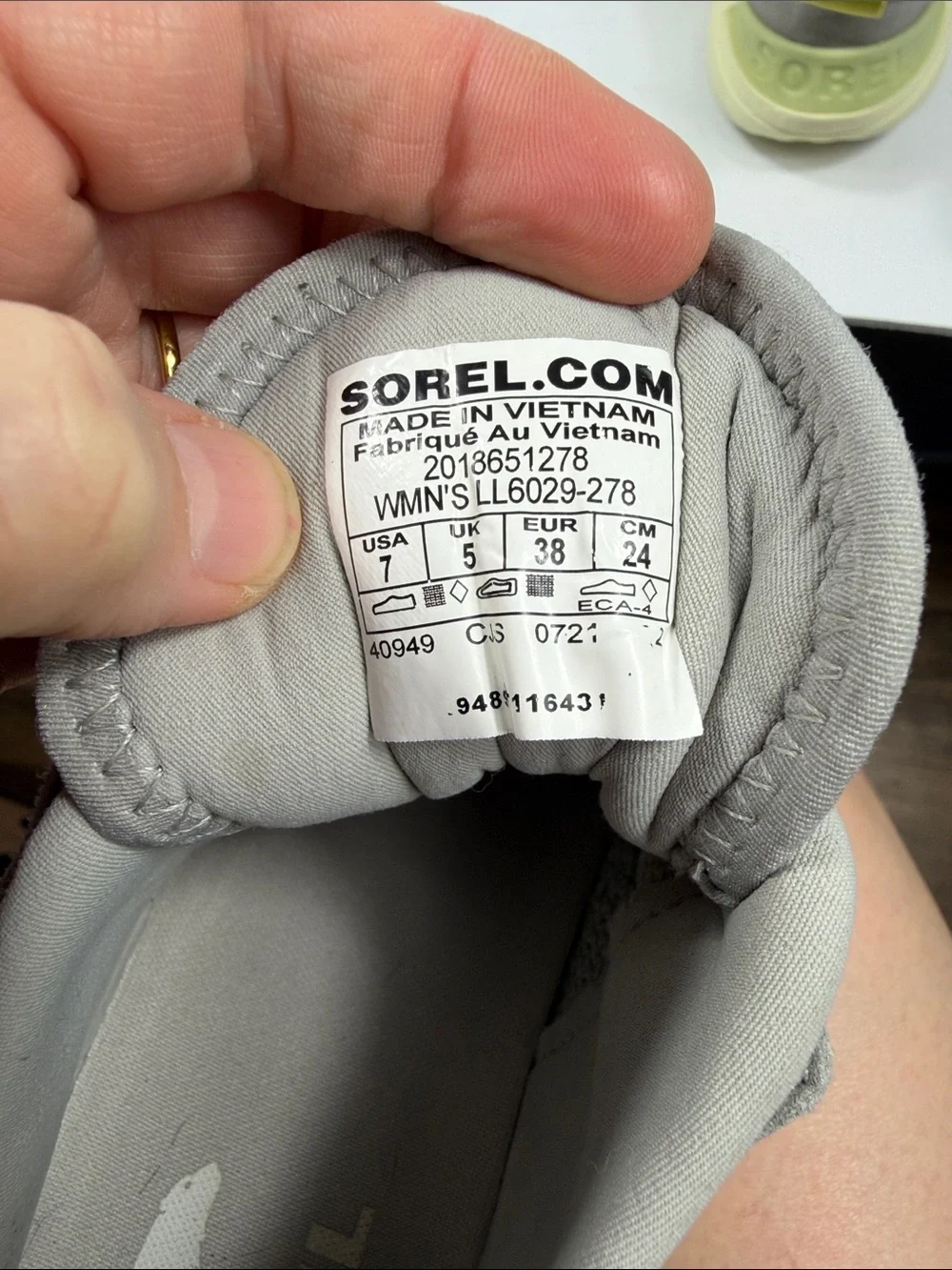 Sorel Women’s‎ Explorer Blitz Stride Strap Sneaker in Dark Stone/Bolt Hint.